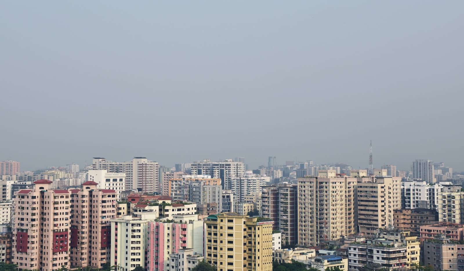 Daytime skyline of Dhaka, Bangladesh, where the Hold.bd team is based.